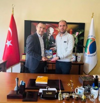 Kaman Uygulamalı Bilimler Yüksekokulu Müdürü Doç. Dr. İsa Bahat’a “GASTRO KIRŞEHİR” Kitabı Takdim Edildi